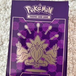 POKEMON BLANK SLEEVES AND A FEW RANDOM CARDS